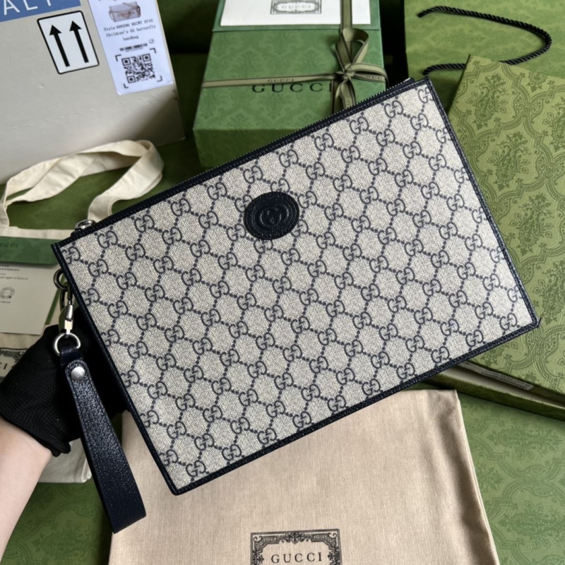 G*u*i clutch bags